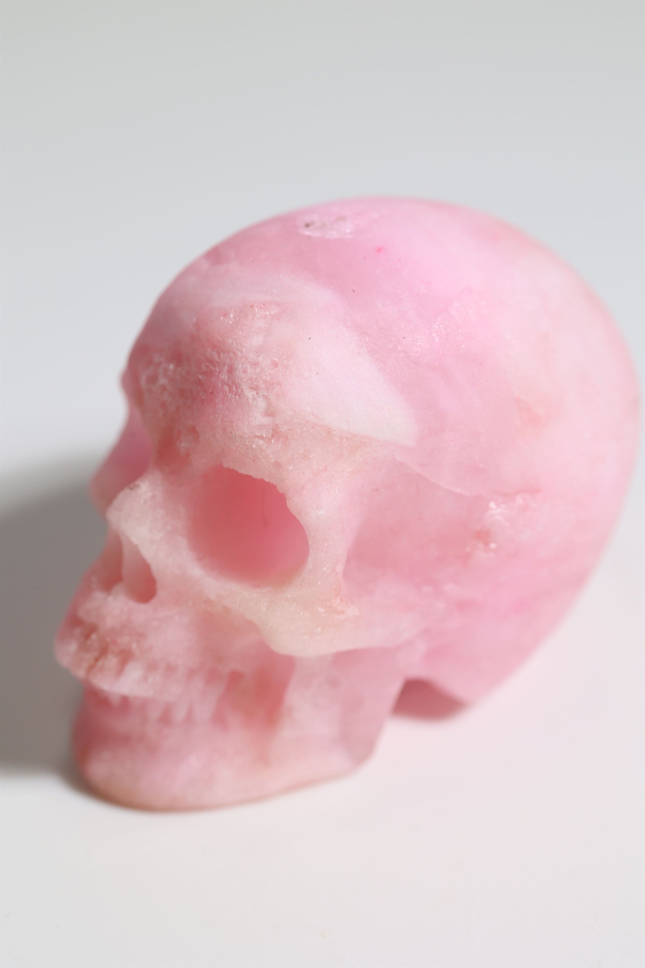 Pink Aragonite 2" Skull - Forgotten Rarities
