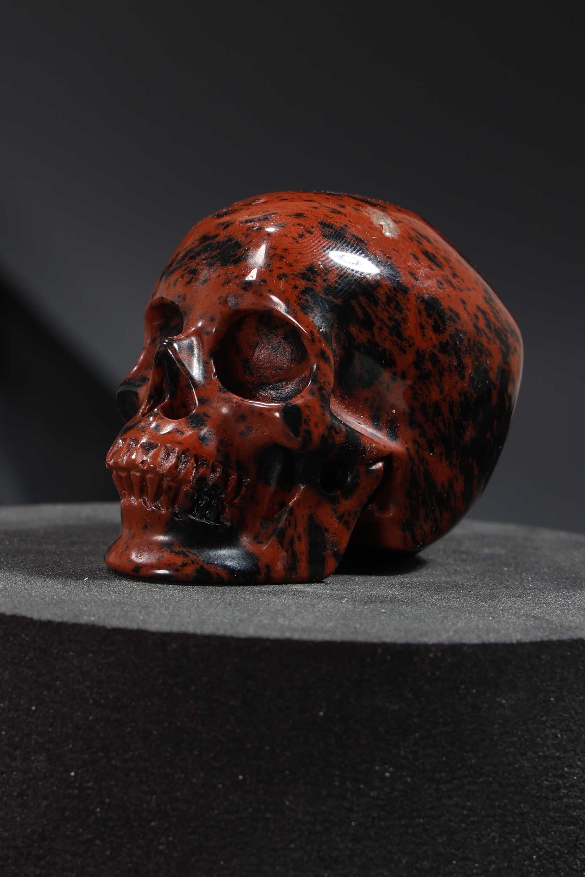 Mahogany Obsidian Skull Carving