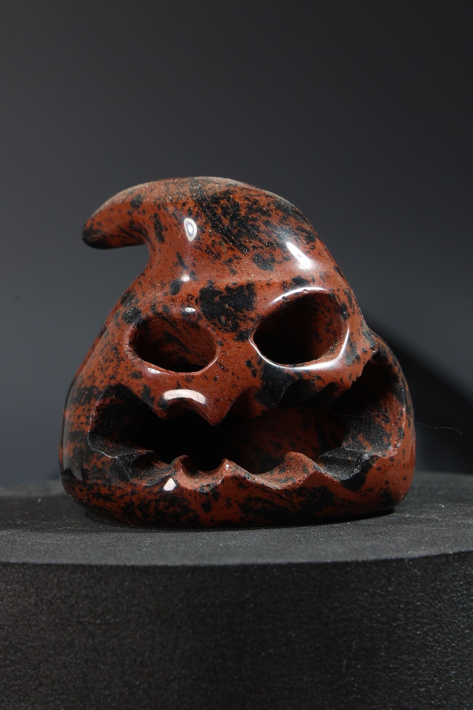Hallow Mahogany Obsidian Oogie Boogie Skull Carving