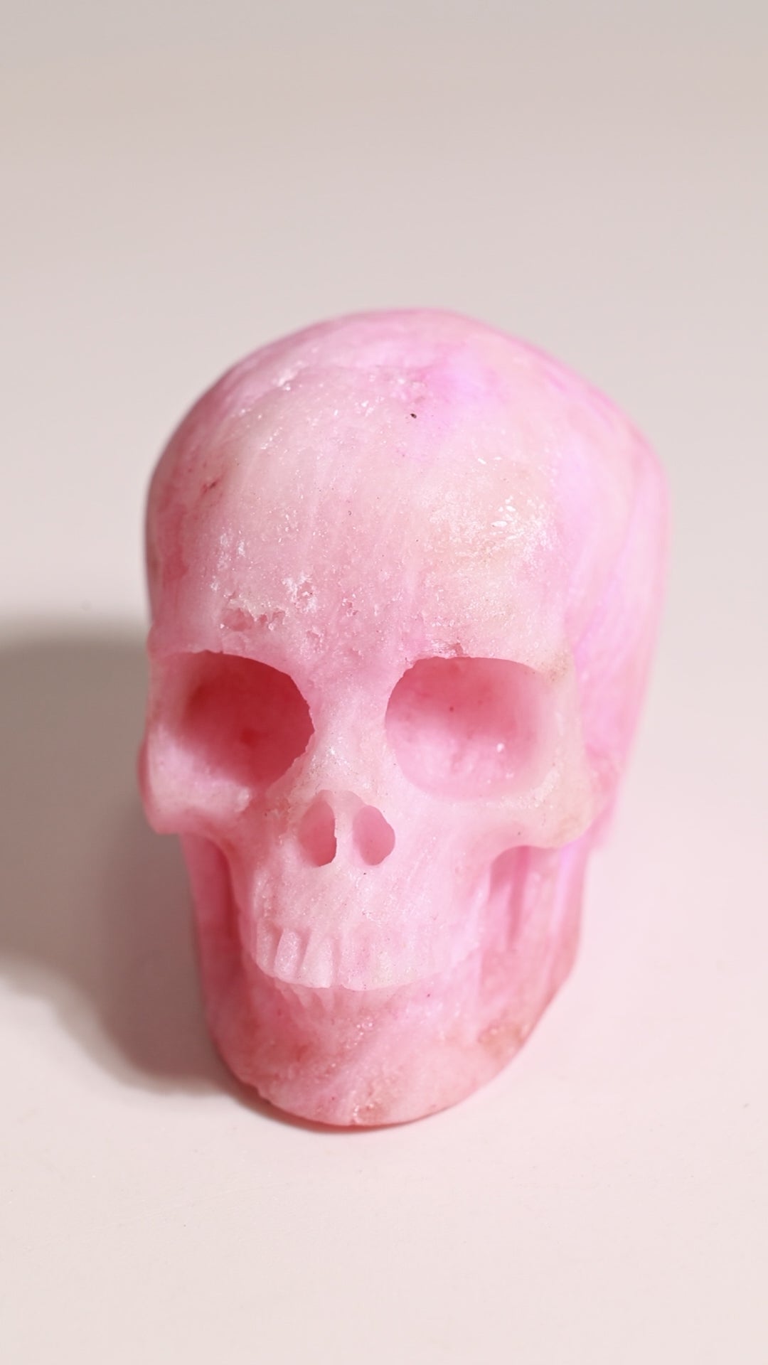 Pink Aragonite 2" Skull