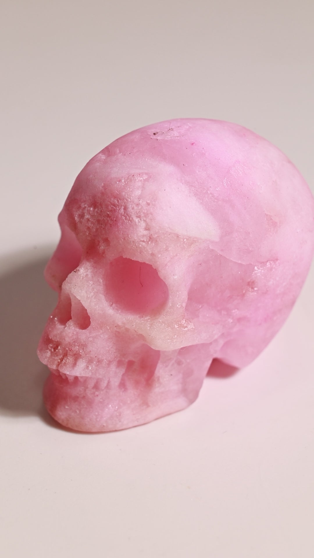Pink Aragonite 2" Skull